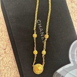 CHANEL Gold Chain Necklace with Embossed Medallion